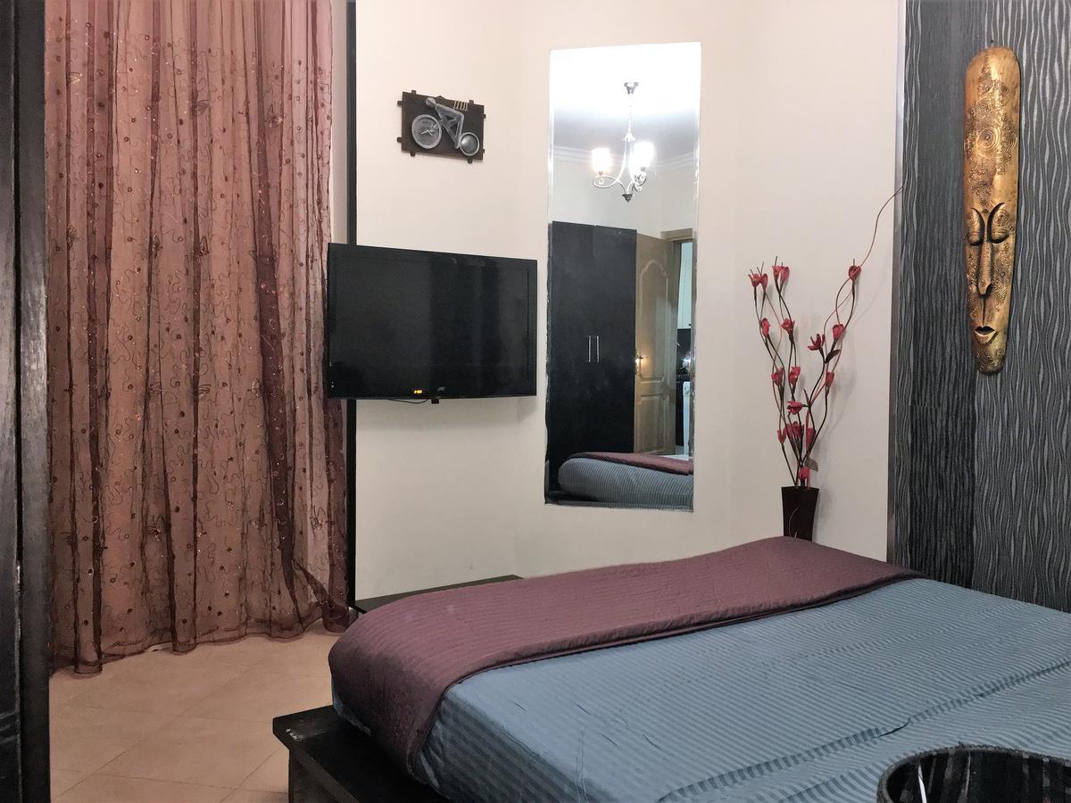 Pool View Apartment At British Resort - Unit 02 Hurghada Bagian luar foto